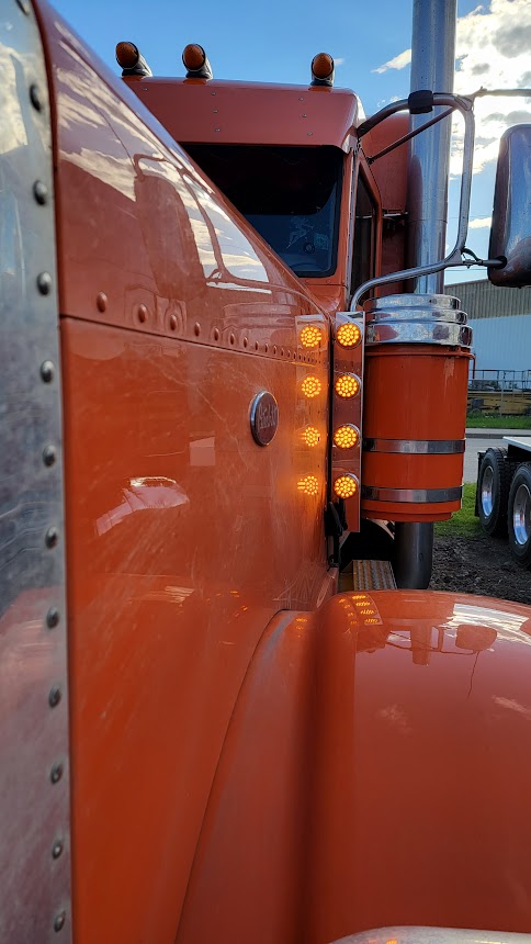 Peterbilt Air cleaner and Front watermelon light bar.